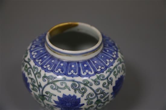 A rare Chinese doucai lotus flower jar, Wanli six character mark and probably of the period, (1573-1619), H. 9.5cm, D. 10.8cm, later